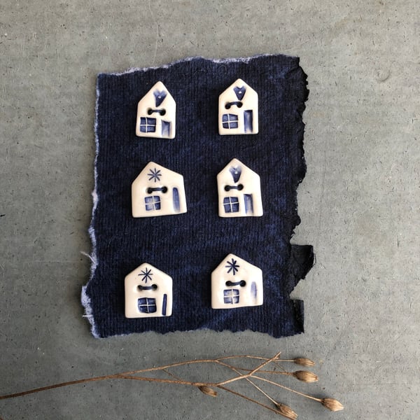 Ceramic house buttons .