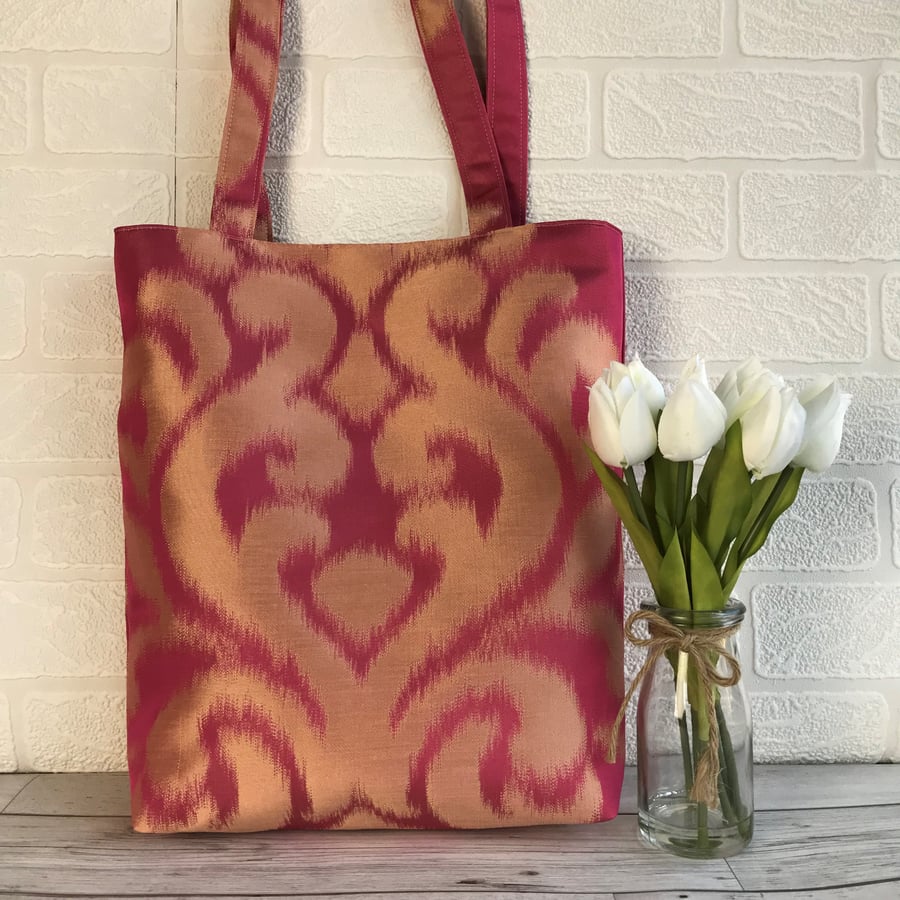 SALE, Hot pink tote bag with a shiny gold scrolled pattern