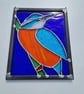 Stained glass kingfisher bird panel.