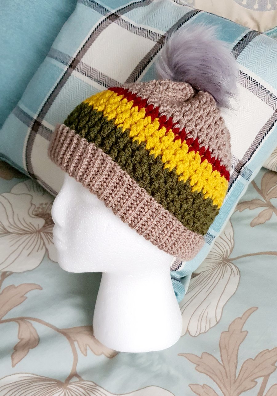Bright crochet hat with pompom
