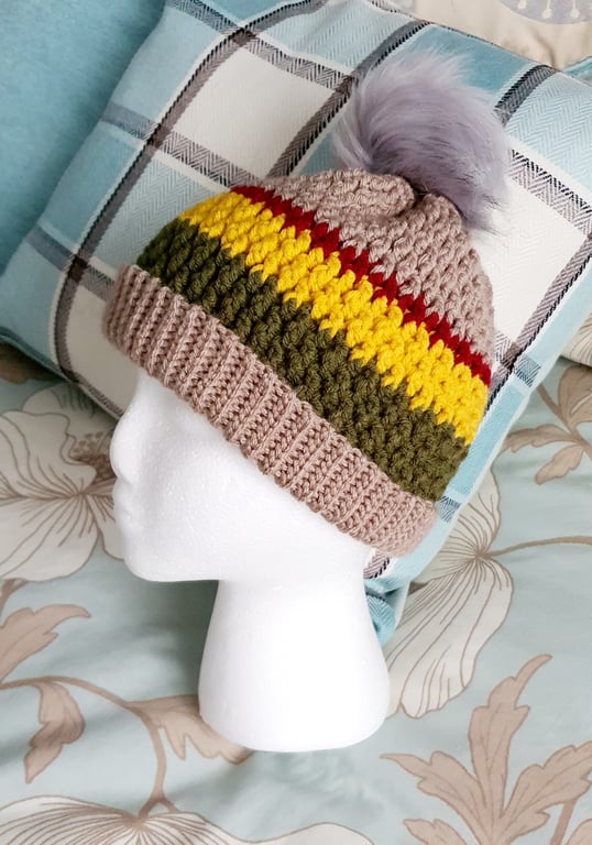 Bright crochet hat with pompom