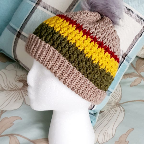 Bright crochet hat with pompom