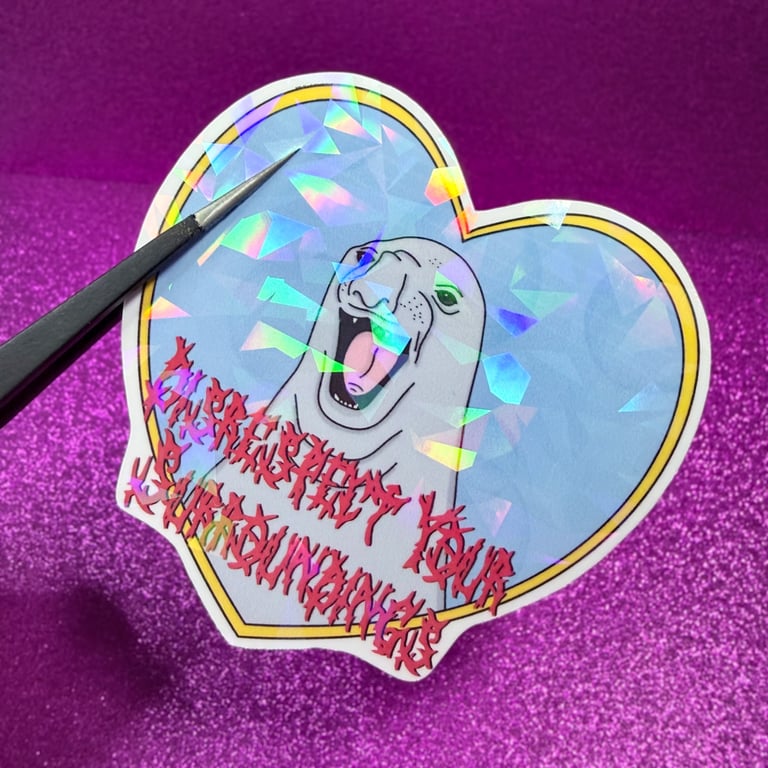 Neil The Seal 'Disrespect Your Surroundings' Holo Shatter Heart Shaped Sticker