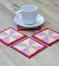 Set of Four Yellow and Purple Spring Flowers and Red Pinwheel Coasters - Image 1
