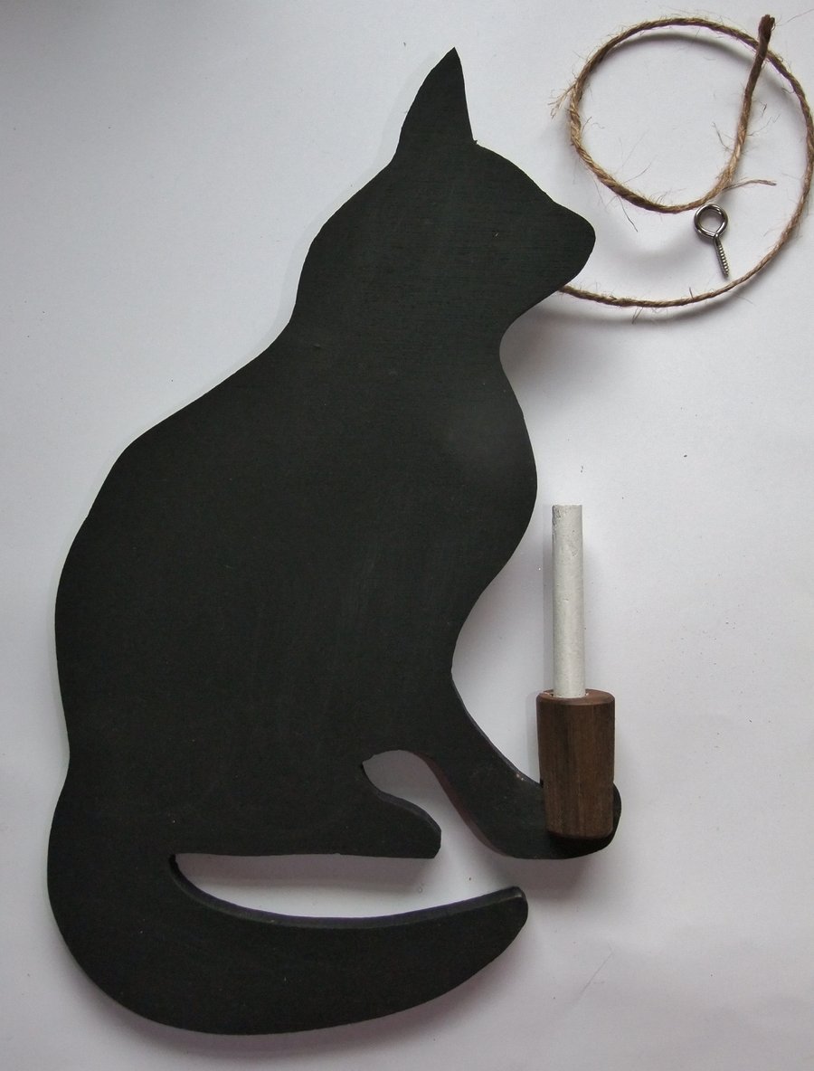 Black cat chalkboard wallhanging for messages holding her stick of chalk