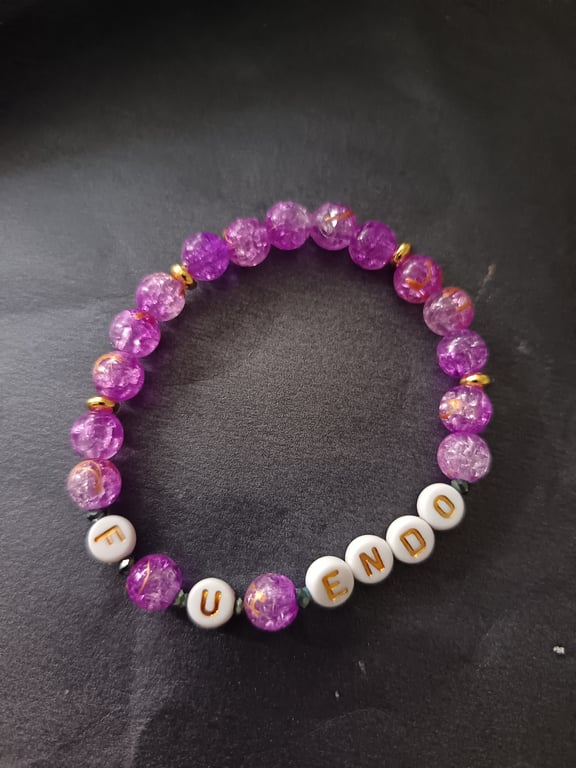 Elasticated purple beaded endometriosis letter bracelet