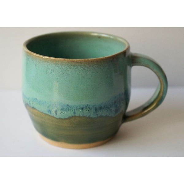 Green two-tone handmade pottery mug 8cm x 8cm