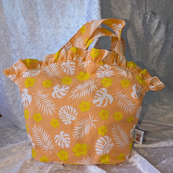 Orange tropical leaves handbag with ruffle top