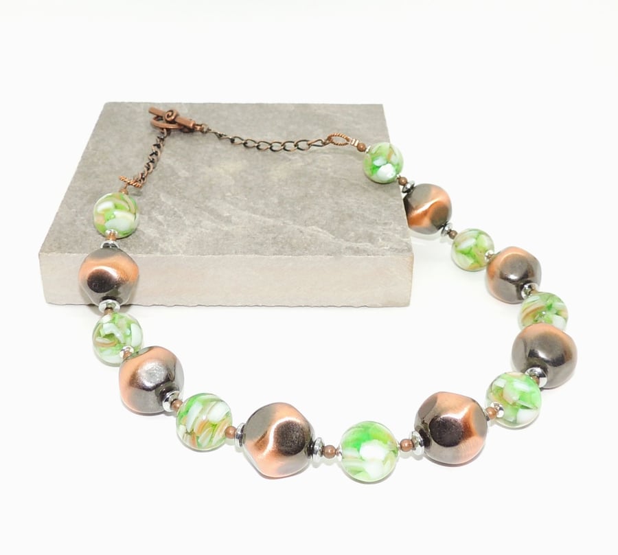 Large bead necklace with crushed shell and metallized beads