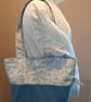 Blue tote bag with pockets and magnetic popper fastening.   - Image 6