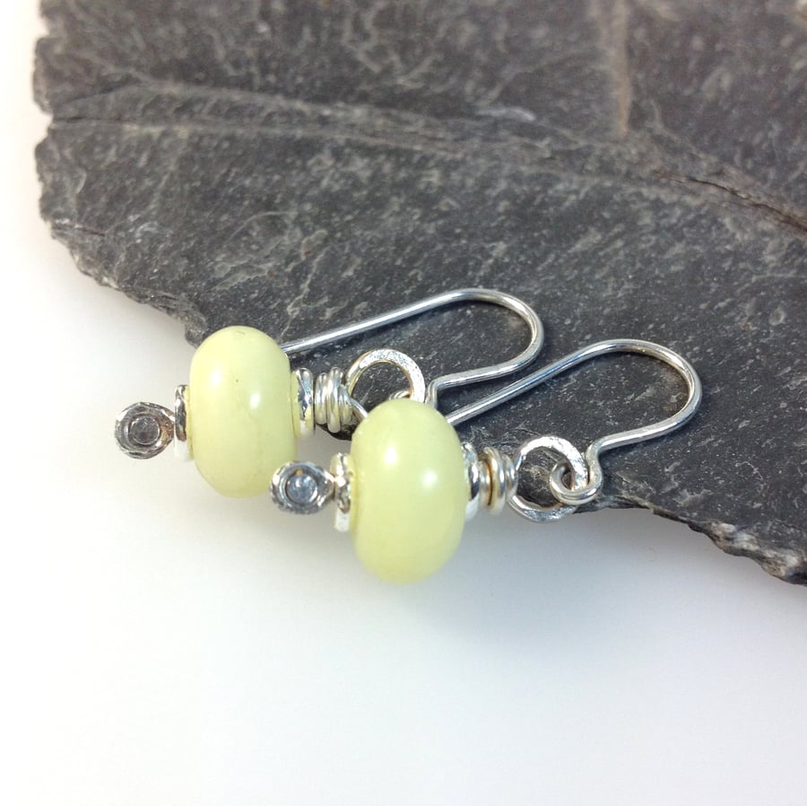 butter jade and silver earrings