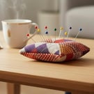 Kente Pin Cushion in cream, red and purple