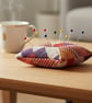 Kente Pin Cushion in cream, red and purple