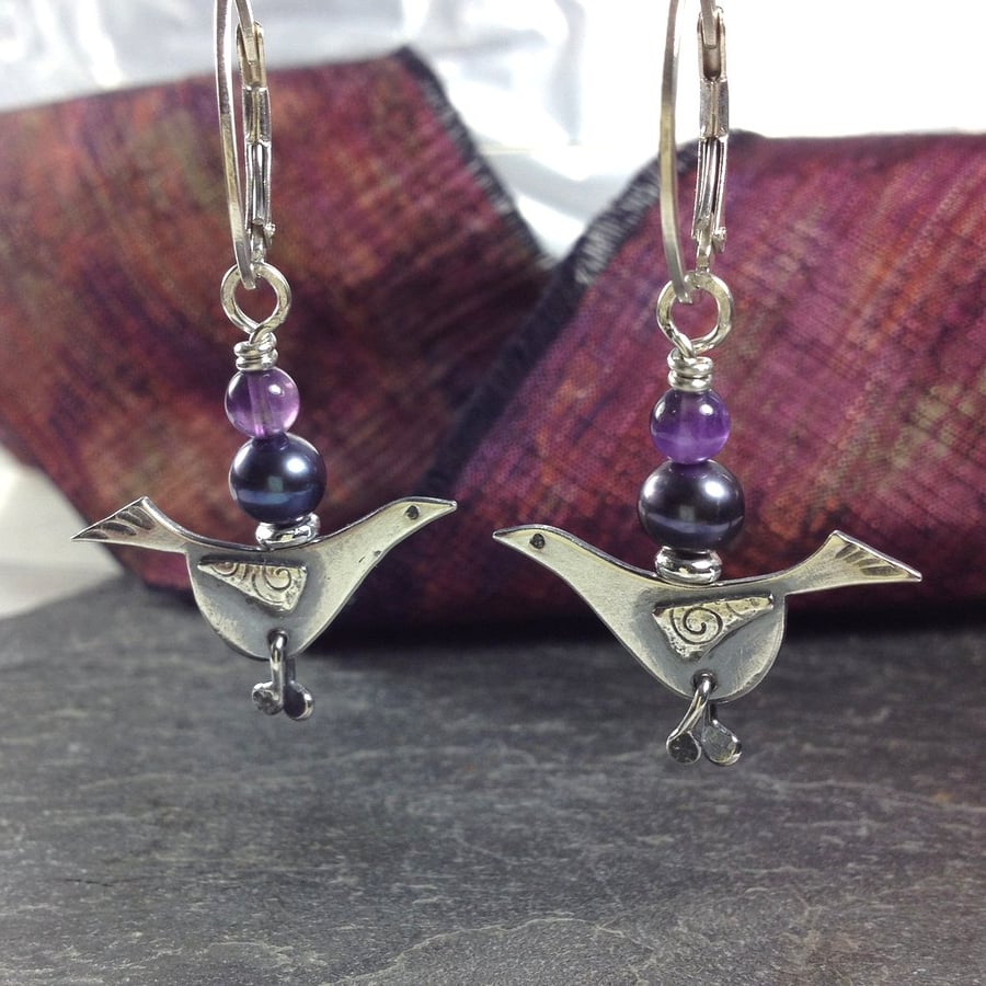 silver blackbird earrings with black pearl and amethyst.