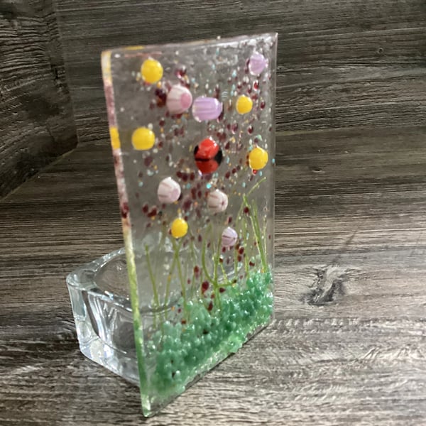 Handmade floral fused glass tea light holder