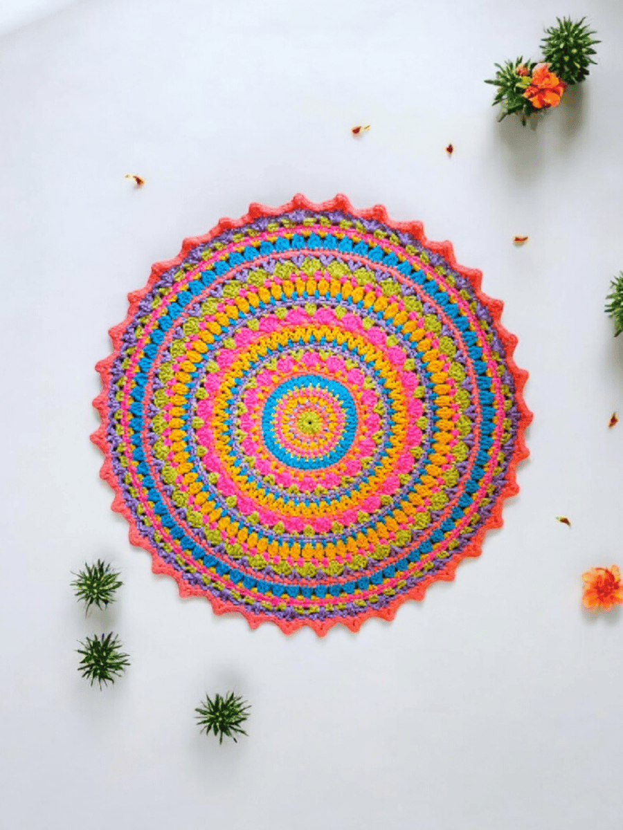 Large, bright crochet mandala doily table mat