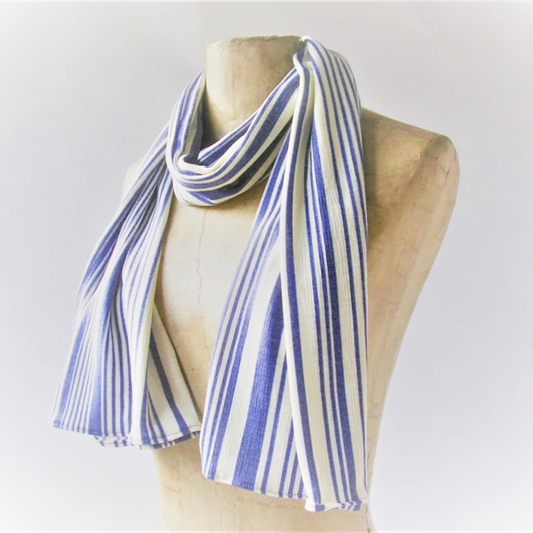 Striped light weight draping unisex scarf in light blue and cream stripes