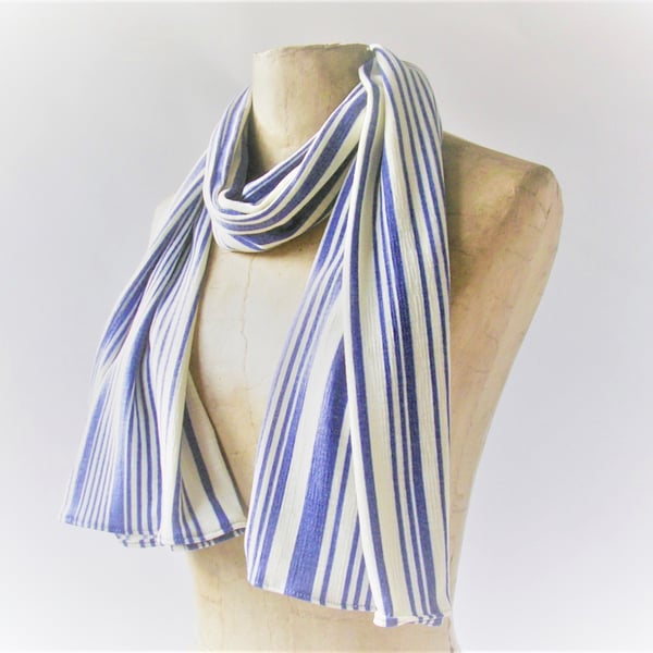 Striped light weight draping unisex scarf in light blue and cream stripes