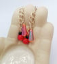 Earrings with Orange Artemis Beads Red and Black Beads on Long Chains - Image 7