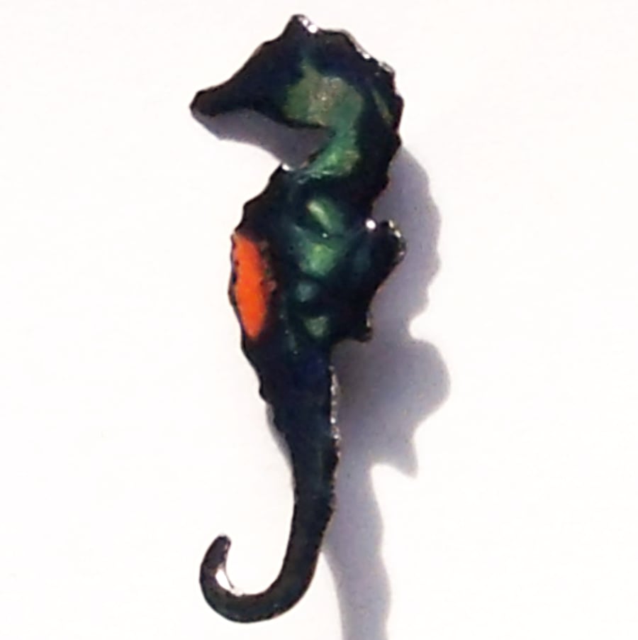 seahorse brooch - red and blue-green scrolled on dark blue enamel over clear