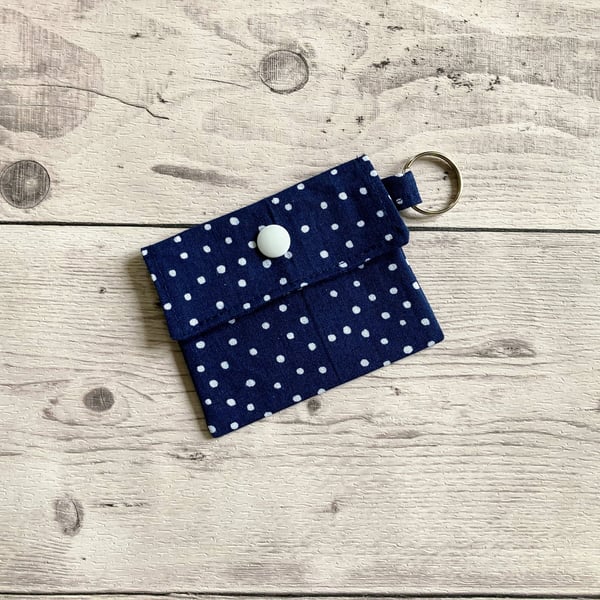 Lip balm keyring. Blue and white polka dot themed cotton fabric.