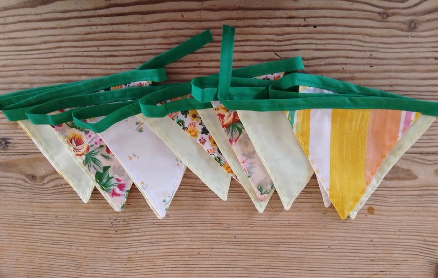 Handmade mini bunting made in a yellow floral theme.