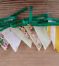 Handmade mini bunting made in a yellow floral theme.