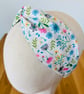 Cotton headband, twist knot style hairband in a white, pink & blue floral design - Image 2