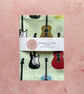 Fabric Handmade Pretty Cotton Tea Towel with a Coloured Guitar Design. - Image 1