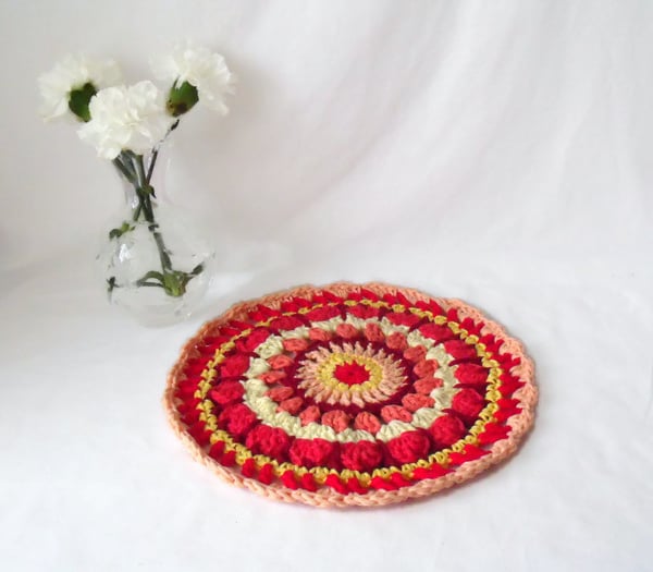 vibrant crocheted cotton doily, bright crochet table centrepiece mandala