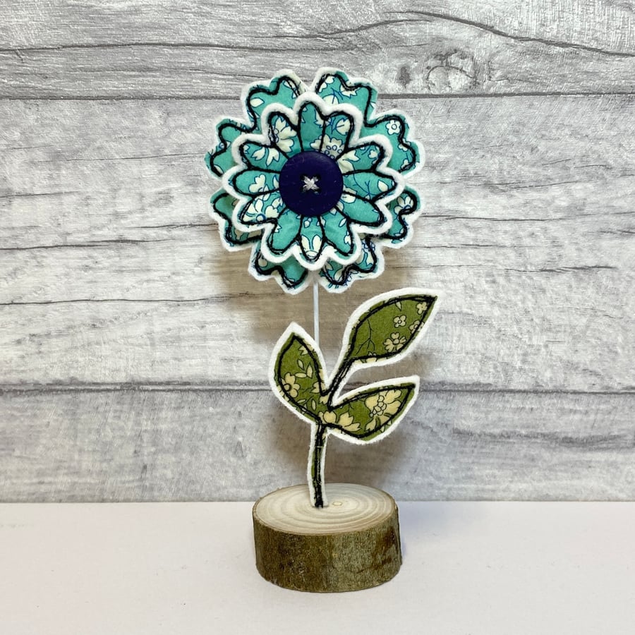 Flower and Leaf on a Wire Stem in a Wooden Stand