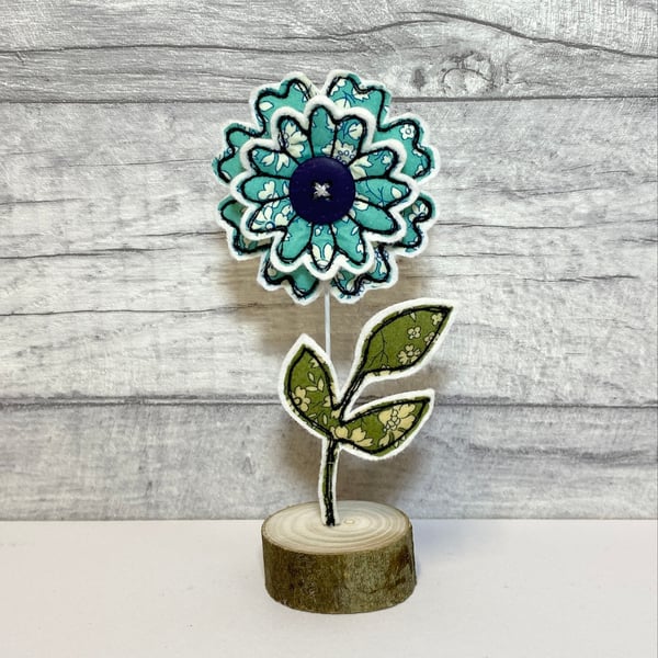 Flower and Leaf on a Wire Stem in a Wooden Stand