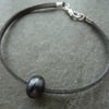 grey faux suede lampwork glass bracelet