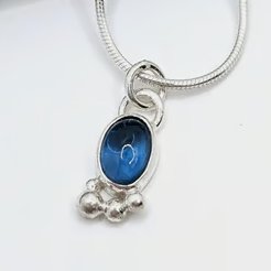 Sterling Silver London Blue Topaz Pendant with Granulation on a Silver Necklace