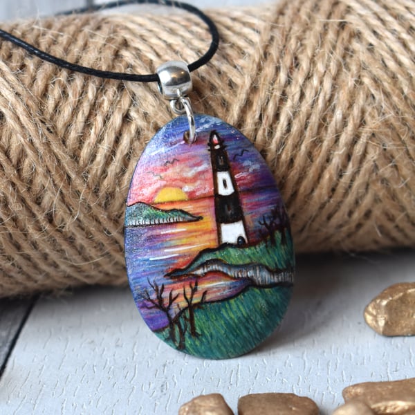 Pyrography lighthouse sunset wooden pendant.