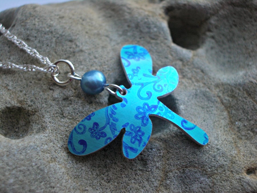 Dragonfly necklace pendant in turquoise with flowers and blue pearl