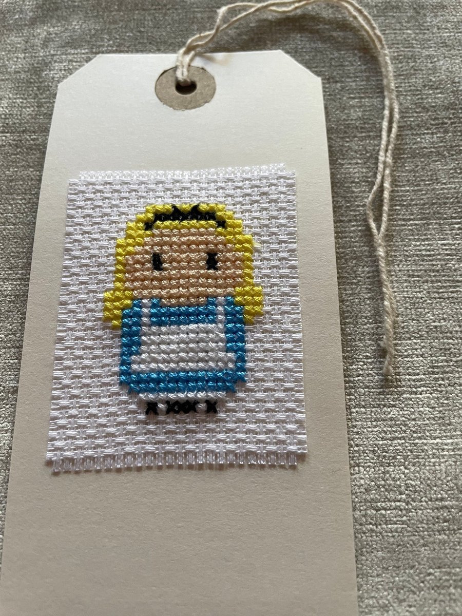 Alice in Wonderland cross stitched gift tag