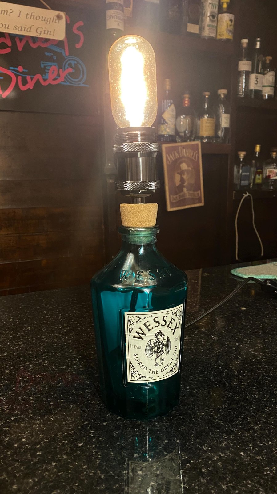 Up cycled spirit bottle into vintage style lamp