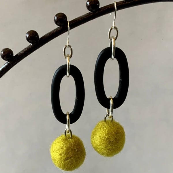 Contemporary felt wool ball and rubber earrings