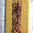 Mounted handwoven tapestry weaving,  textile art in browns, grey  and red