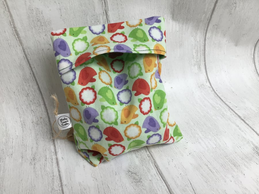 Large reusable snack bag with food-safe lining. Green birds