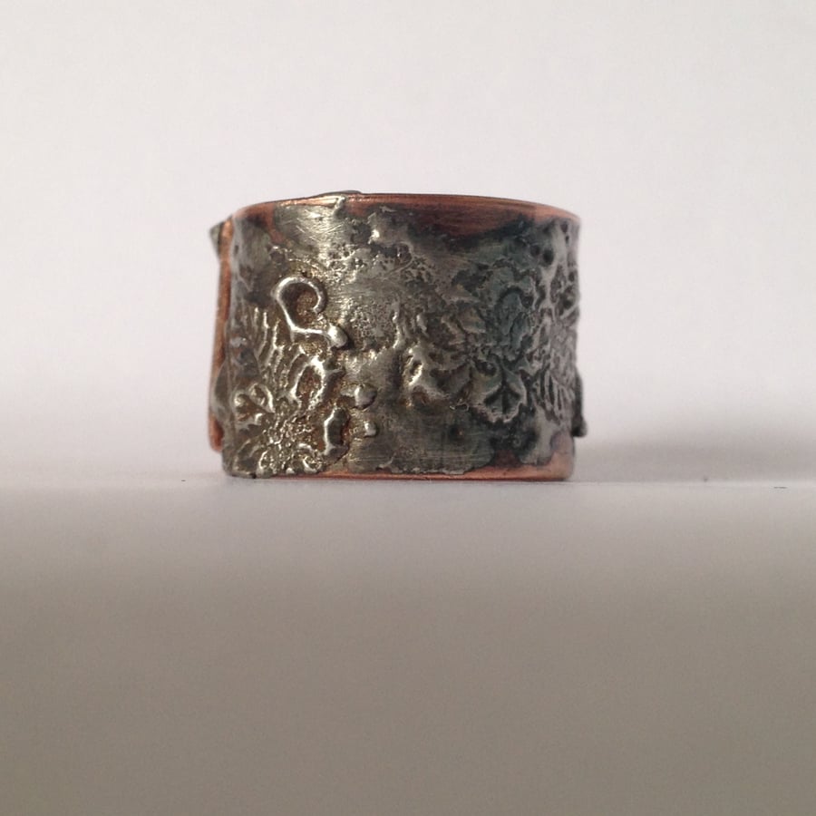 Silver solder and copper flower ring 