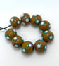 Handmade brown and turquoise lamp work glass beads - Image 6