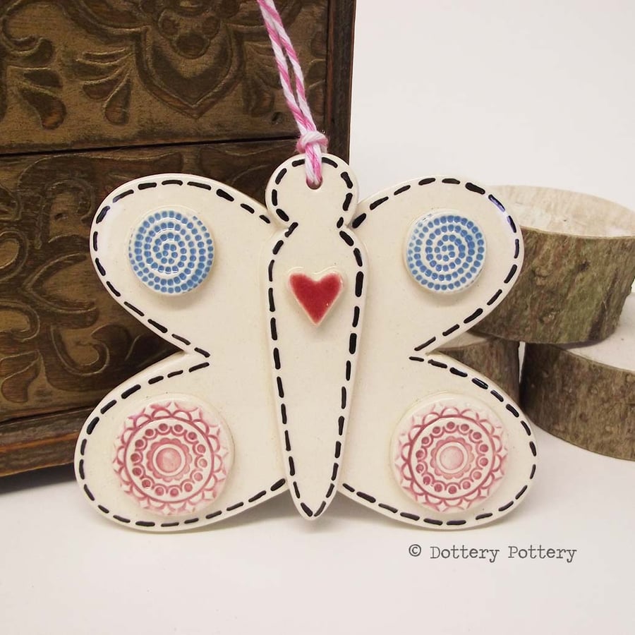 Pottery Butterfly Ceramic decoration. Illustrated Butterfly pottery decoration