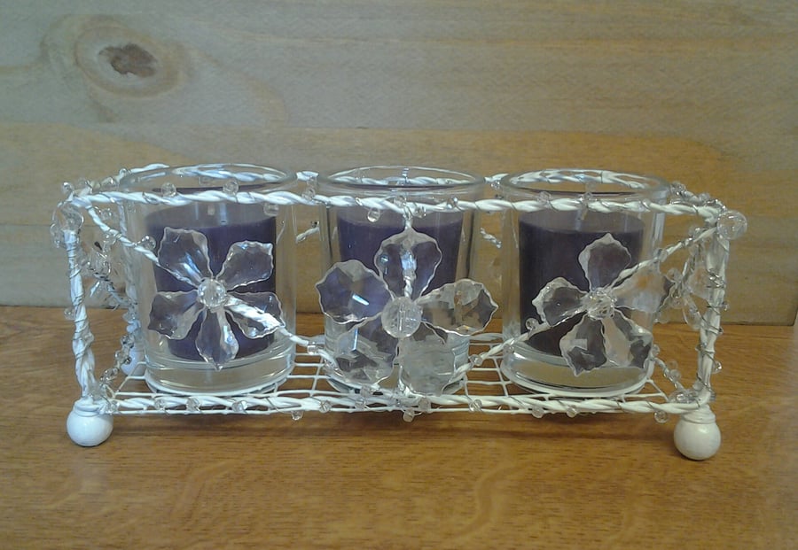 Wire candle holder with scented candles