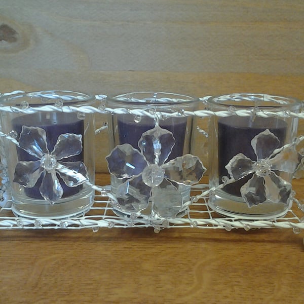 Wire candle holder with scented candles