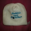 Hand made sewn baby hat in soft fleece fabric -cream with turquoise writing