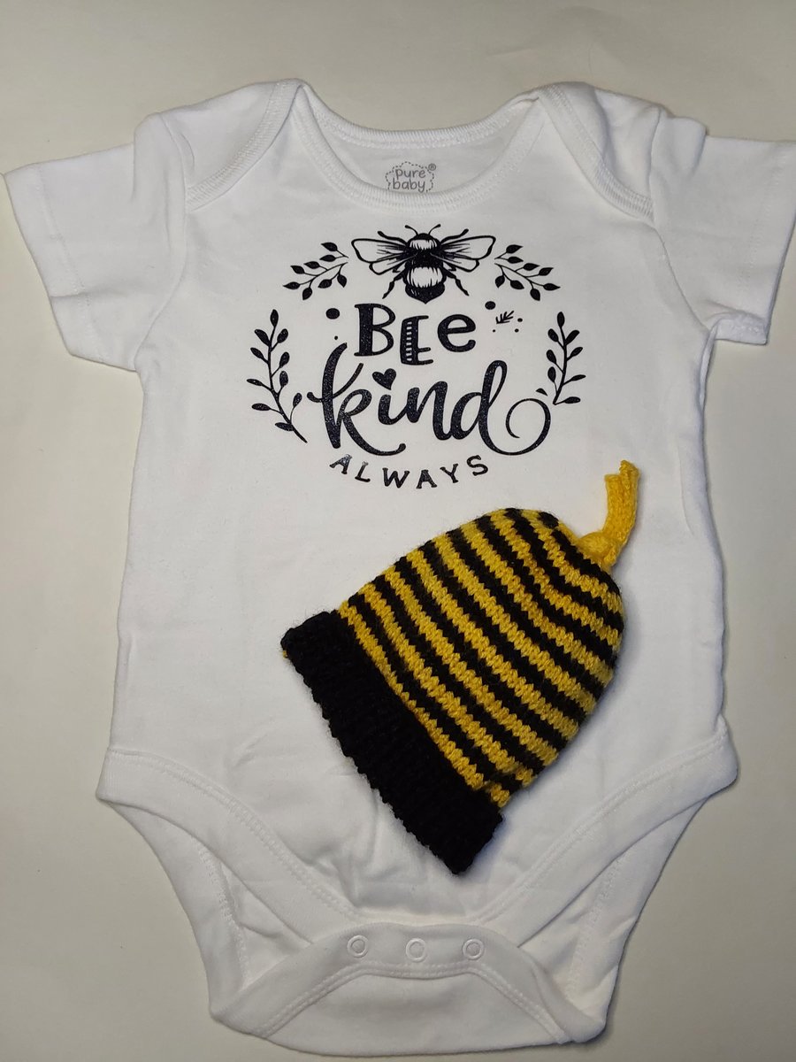 Hand Knitted 6-9 months baby hat black and yellow with matching printed vest
