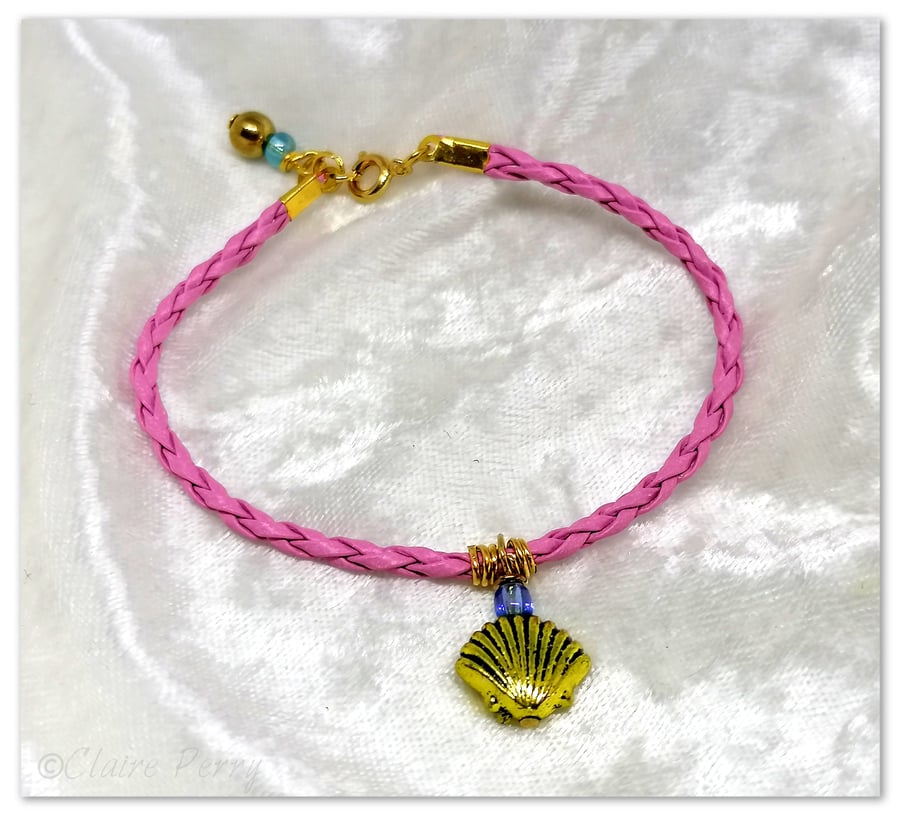 Bracelet Light pink  Faux Leather with gold plated Shell charm bead.