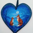 Foxes by moonlight